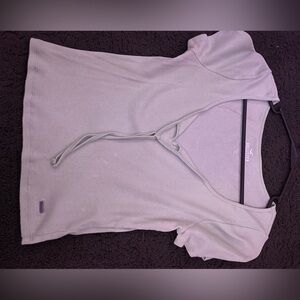 Light green t shirt, small bleach stain on back